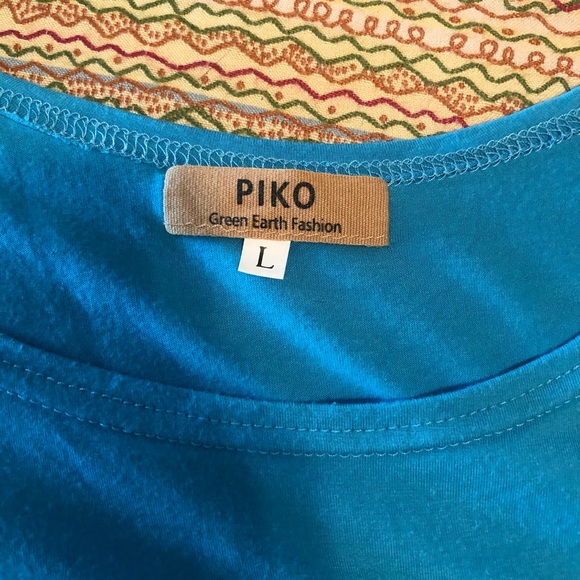 Blue short sleeve Piko top - Picture 1 of 2